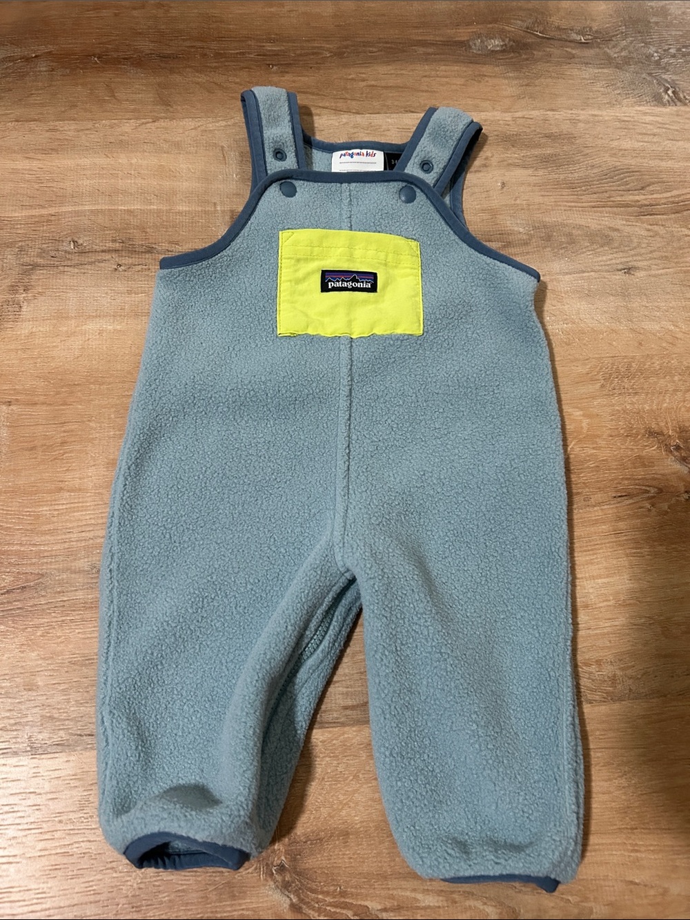 Patagonia Kids Synchilla Fleece Bibs in Blue with Yellow Pocket